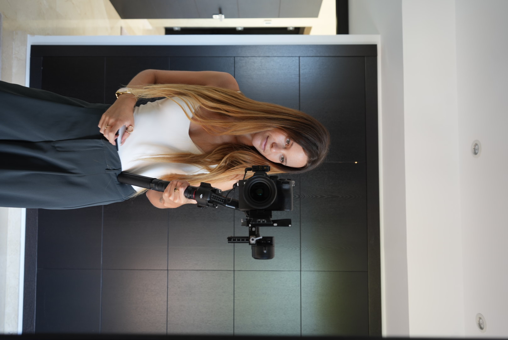 Savannah filming with a camera on a gimbal